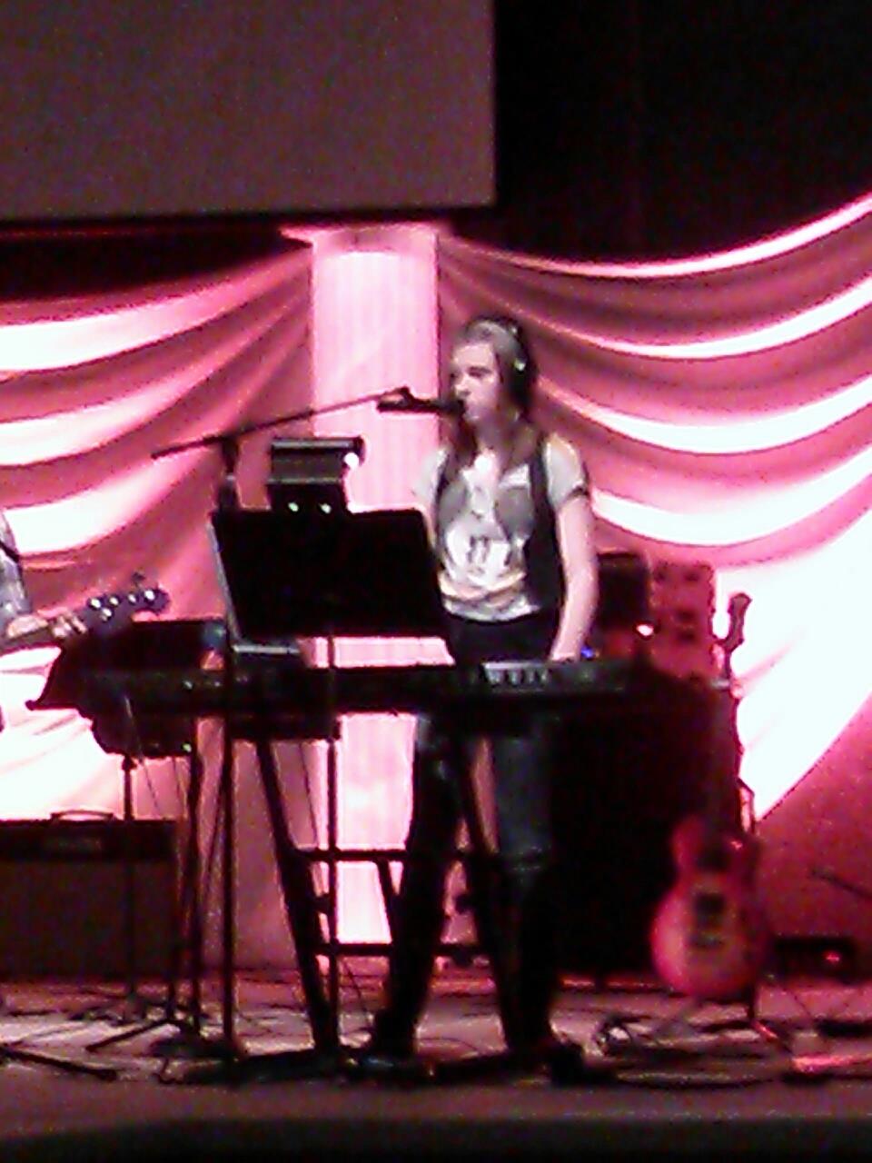 Hannah leading worship at church